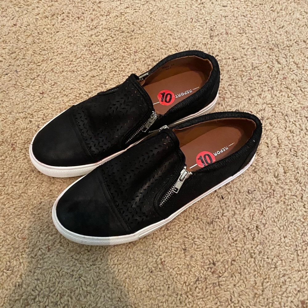 Report black slide on sneakers